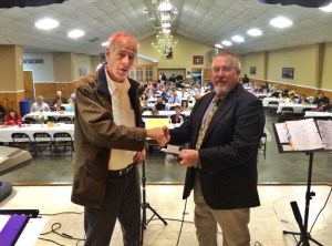 Director Mike Borden received the generous donation thanking the supervisor for his continued support.